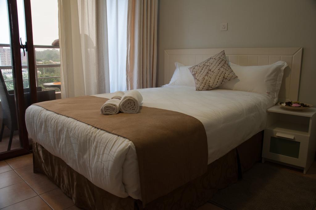 Eddy Suites, Emeli Hotel Найроби Экстерьер фото