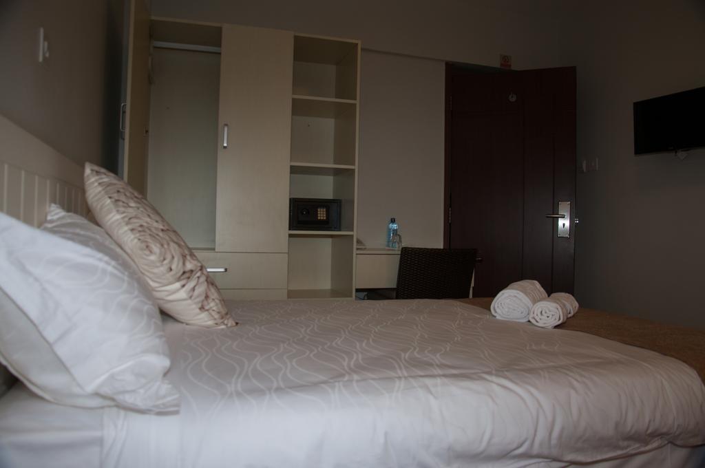 Eddy Suites, Emeli Hotel Найроби Номер фото