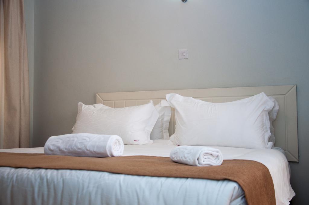 Eddy Suites, Emeli Hotel Найроби Номер фото
