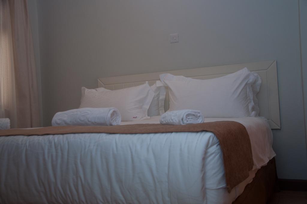 Eddy Suites, Emeli Hotel Найроби Экстерьер фото